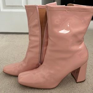 Pink patent leather booties.